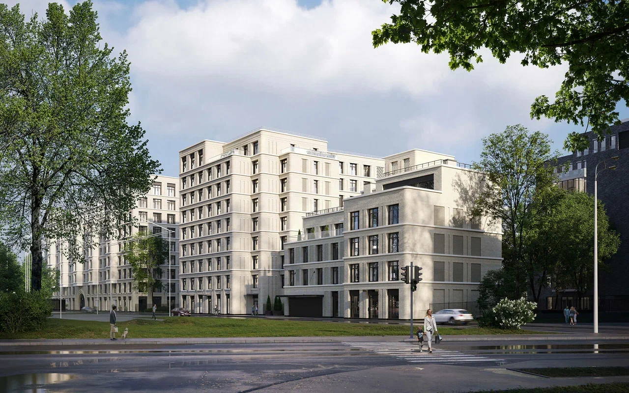 Общий вид жилого комплекса «Визионер» с зеленой зоной и современной городской инфраструктурой, светлые фасады из кирпича